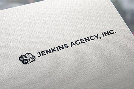 Jenkins Agency, Inc. logo printed on a paper